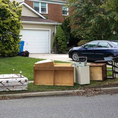 junk-outside-of-a-house